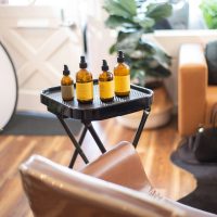 yellow and black bottles on table